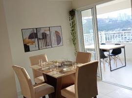 Duas suítes em apartamento luxuoso c/ área gourmet.，位于波苏斯-迪卡尔达斯的酒店