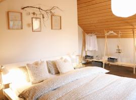 Grande chambre à louer，位于Courtedoux的酒店