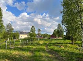 Nydelig småbruk med hus og fjøs og badstu，位于Gratangen的酒店