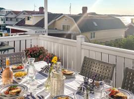 Nice Home In Bovallstrand With Kitchen，位于Bovallstrand的酒店