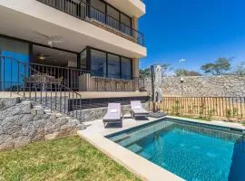 Private and heated POOL with ARCH VIEW new condo!