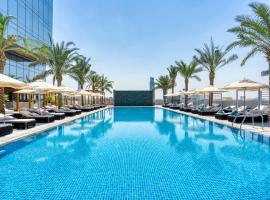 The First Collection Dubai Jumeirah Village Circle, a Tribute Portfolio Hotel by Marriott，位于迪拜阿勒马克图姆国际机场 - DWC附近的酒店