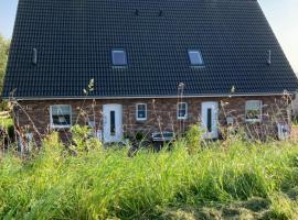 Ferienhaus Momke am Diek Haushälft A，位于Simonsberg的酒店