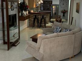 Apartamento confortable, cerca a la Basílica，位于布加的酒店