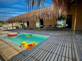 Hermosa Casa con Piscina y Playa Privada