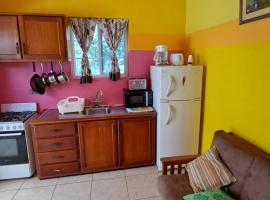 Fish Tobago Guesthouse or Joy and Brandon Guesthouse，位于Buccoo的旅馆