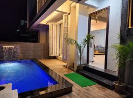 Unplugged Villa ll Private Pool ll 2BHK ll AC ll BBQ，位于罗纳瓦拉的宠物友好酒店