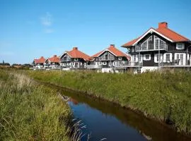 6 person holiday home on a holiday park in Bogense