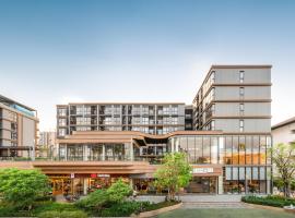 Salaya One Hotel & Service Apartment，位于萨拉耶的住宿