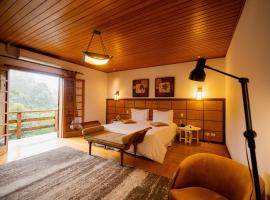 Pousada Apple House Campos do Jordao，位于坎波斯杜若尔当的酒店