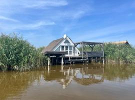 Seehütte Neusiedlersee inklusive Boot，位于拉斯特的酒店