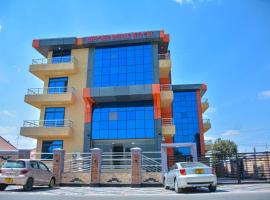 UNIQUE ROYAL HOTEL AND SUITeS，位于多多马的酒店