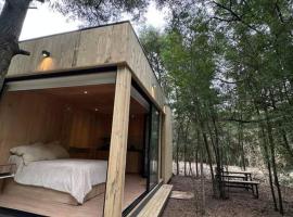 Tiny house en pleno bosque a metros de la laguna，位于查斯科穆斯的酒店