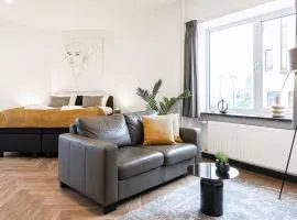 Spacious City Loft with Balcony & High-Speed Wi-Fi