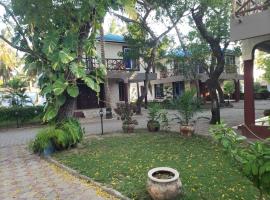 Kwa Mama Village Beach Resort，位于达累斯萨拉姆的酒店