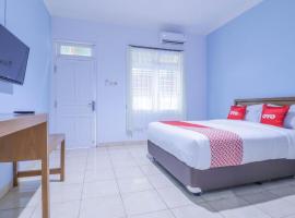 OYO 1755 De'balcon Accomodation Near Ngurah Rai Airport，位于乌布伍拉·赖国际机场 - DPS附近的酒店