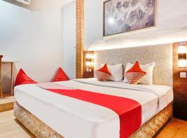 OYO 90314 Stadion Guesthouse Syariah，位于西冷的酒店