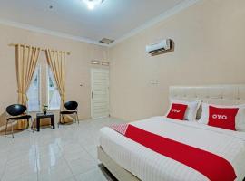OYO 93033 Mutiara Homestay Syariah Near TPA / TPSA Nurul Yakin，位于Payakumbuh的酒店