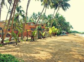 OYO 246 Roy Villa Beach Hotel，位于贝鲁沃勒的酒店