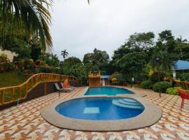 Rainbow Forest Paradise Resort and Camping Area by Cocotel，位于塔奈的酒店