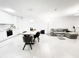 Özels Designer Loft Metzingen - Smart TV, Netflix, private kostenlose Tiefgarage, Self-Express Check-in,Check-out, Outlet 100m