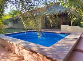 Beach House with Pool Steps away from the beach