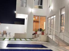 Al Ashkharah Nights Chalate，位于阿夏尔奇亚的酒店