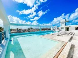 CARIBBEAN DELUXE Ducassi SUITES STUDIOS HOTEL ROOFTOP POOL Beach CLUB & SPA