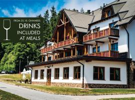 Pohorje Village Wellbeing Resort - Wellness & Spa Hotel Bolfenk，位于霍茨科波霍尔耶的度假村