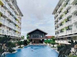 Pool View Condo 333B at Amani Grand Resort near Mactan Cebu Airport，位于Pusok的公寓