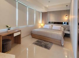 Apartment Nuvasa Bay Nongsa, Kalani 1BR 8th, Sea & Golf View, Batam，位于秾莎的海滩酒店