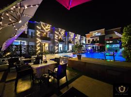 2 Bed Apartment 6 - Chic Benin City Hideaway，位于贝宁城的酒店