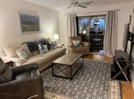 True Blue Spacious Condo on golf course!
