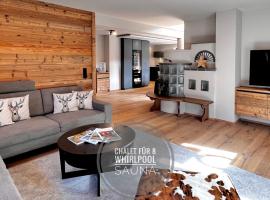 BOUTIQUE KAISERLODGE mit privater SAUNA & WHIRLPOOL by Belle Stay，位于基茨比厄尔的木屋