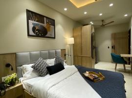 Stayo Rooms Premium Studio garden view，位于古尔冈的酒店