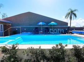 Casa Aconchego I - Piscina aquecida e hidromassagem，位于瓜拉图巴的酒店