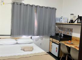 Flat com ar e varanda com linda vista para o Ibituruna - Vôo Livre 203