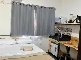 Flat com ar e varanda com linda vista para o Ibituruna