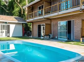 Recanto da Feiticeira | Suítes incríveis com piscina，位于伊利亚贝拉的度假屋
