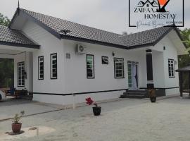 Zaifaa Homestay Pantai Penarik 4 Bilik,2 Bilik Air Dekat Jeti Ke Pulau Redang，位于Kampong Ru Sepuloh的酒店