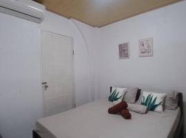 CM Heights Homey 2 bedrooms，位于桑托斯将军城的酒店