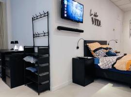 Ruime studio-appartement gelijkvloers，位于Zemst的酒店