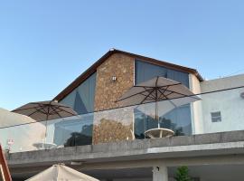 Villa Suíça, Chalé Mezanino，位于蒂安瓜的酒店