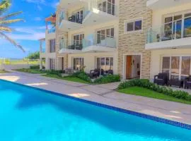 Poolside beachfront living!