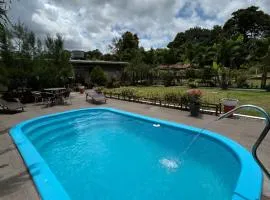 Suíte em uma reserva ambiental com piscina