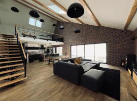 Loft Design Architecte，位于罗阿纳的酒店