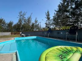 Casinha da Ilha de frente para o mar，位于Subaúma的酒店