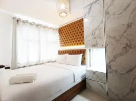 Comfort 2BR at 28th Floor Vida View Makassar Apartment By Travelio