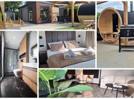 'Relax Lodge Sea' - Wellness lodge in Zeeland - Private Sauna - Airco - Garden - Outdoor Swimming pool - Free Wifi, Towels & Bed linen，位于heinkenszand的木屋