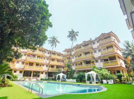 FabHotel Prime Emerald Highland - 500M From Candolim Beach，位于莫尔穆冈的酒店